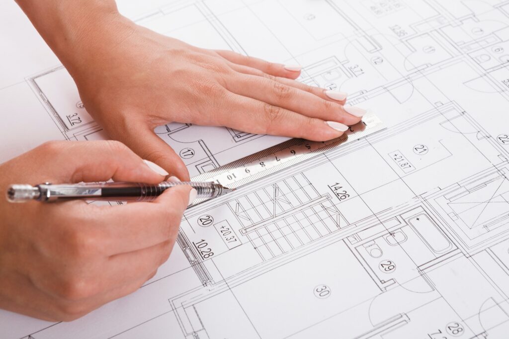 Architect drawing architectural project closeup